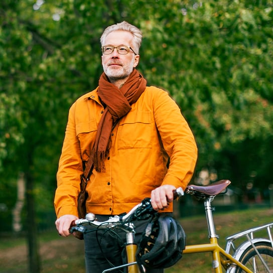 man-standing-park-bike-1-1-544x544px