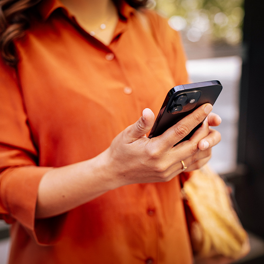 woman-closeup-phone-outside-1-1-544x544px