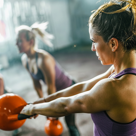 woman-swinging-kettlebell-1-1-544x544px