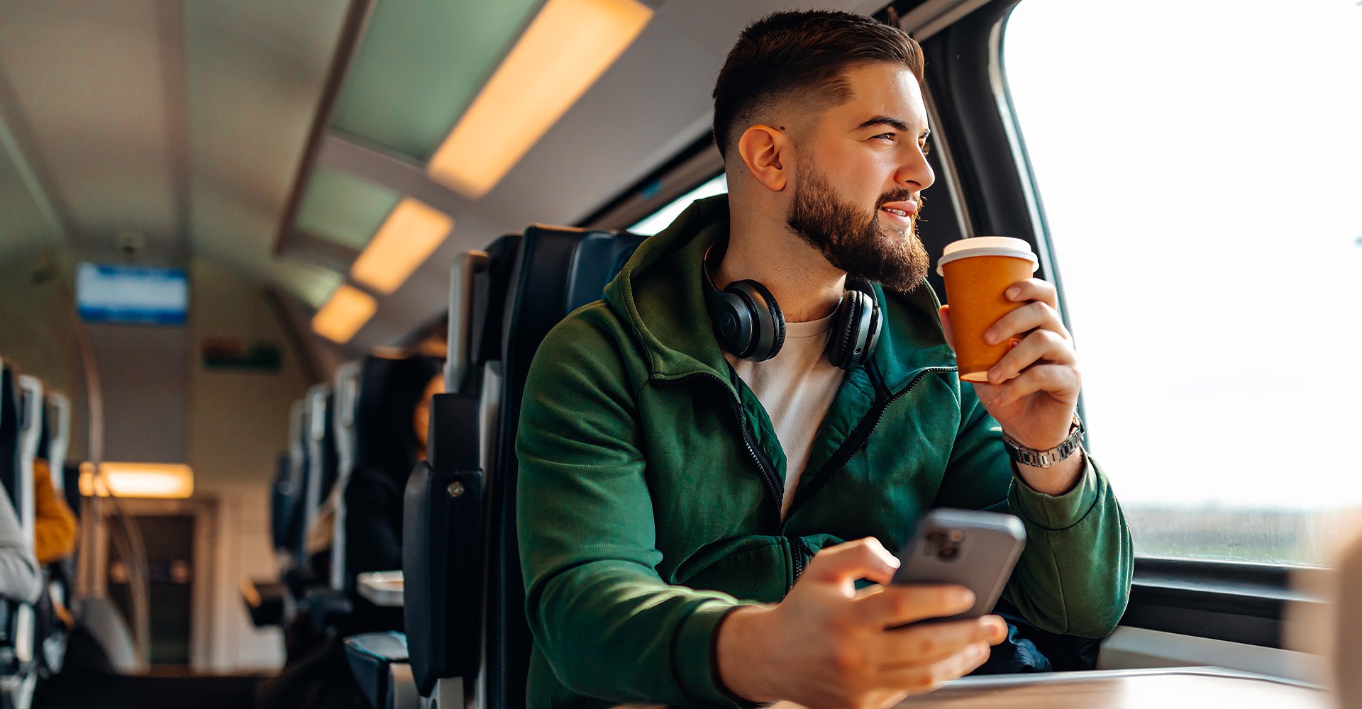 commute-train-looking-out-window-hero