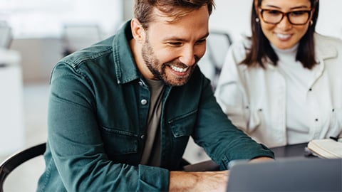 people-office-two-colleagues-laptop-2-col-content