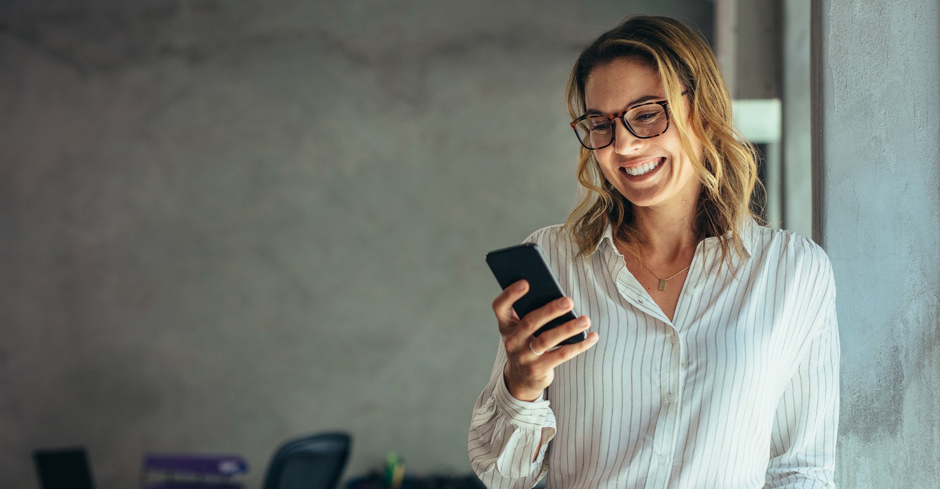 people-phone-standing-checking-phone-hero