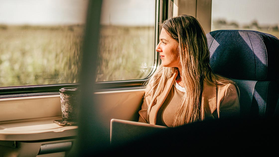 woman-staring-window-commute-16-9-1120x630px