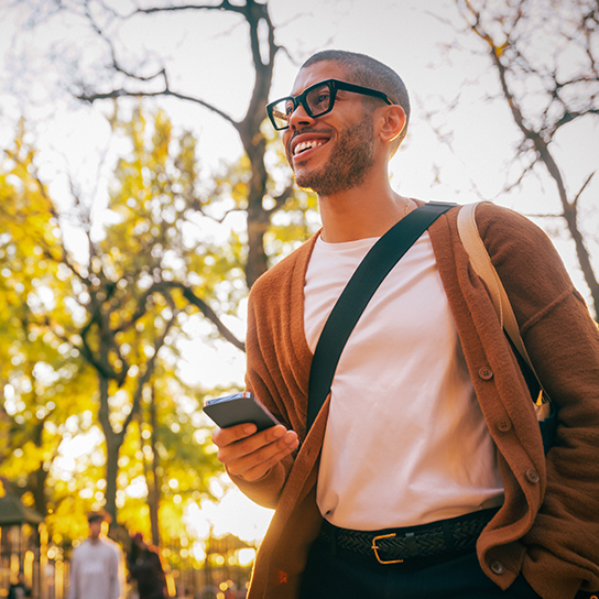 man-walking-phone-outside-1-1-544x544px