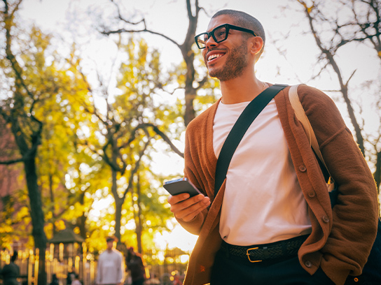 man-walking-phone-outside-4-3-544x408px