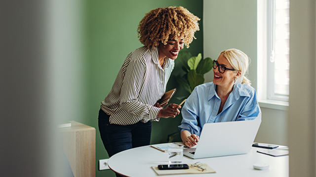 people-office-colleagues-teamworking-laptop-16-9