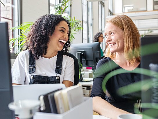 people-office-colleagues-smiling-desk-text-image-4-3